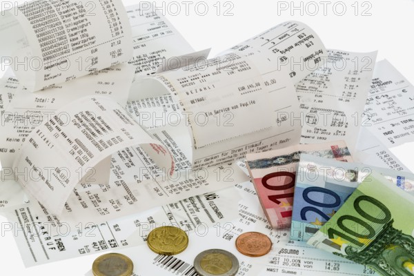 Calculator, receipts and money, symbolic photo for savings, purchasing power and inflation