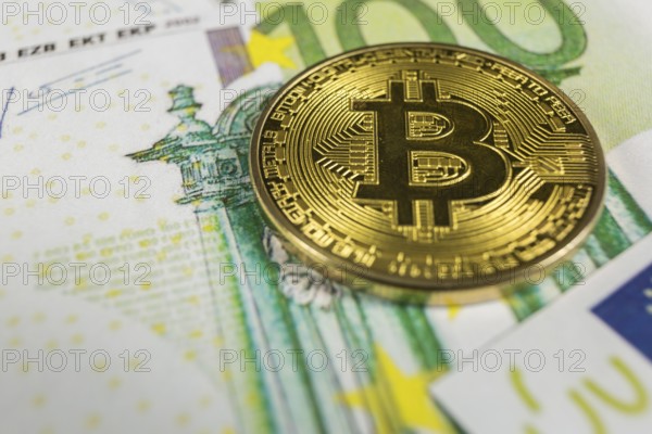 Macro photo of crypto currency concept, A bitcoin with euro bills