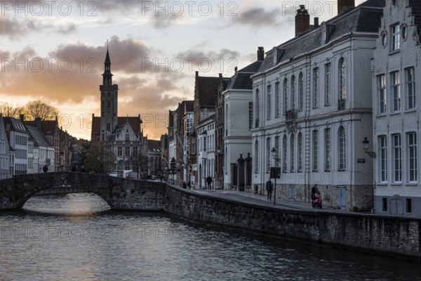 Bruges, West Flemish Region, Belgium, 11 15 2017: The Spiegelrei, the Royalbridge and the Poortersloge tower, Europe