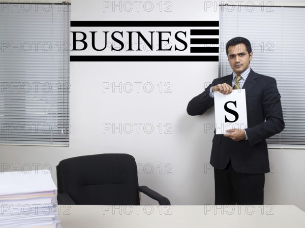 Executive showing word S of business MR#779K
