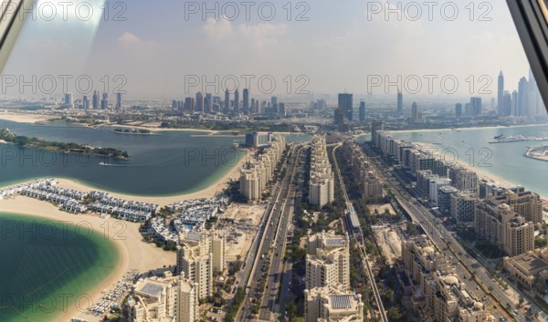 A picture of the Palm Jumeirah Road and the Dubai Internet City District as seen from the View at the Palm