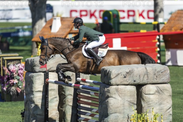 Michael Pender of Ireland, riding HHS Calais competes in the BMO Nations Cup during the CSIO Spruce Meadows, Masters, in Calgary, Alberta, Canada, North America