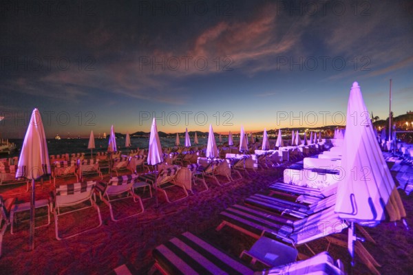 Carlton Beach Club of the Carlton Hotel on the Croisette at sunset, Cannes, Alpes-Maritimes department, Provence-Alpes-Cote d'Azur region, France, Mediterranean Sea, Europe