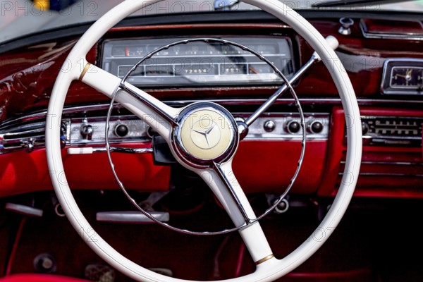 Vintage Mercedes-Benz 220 S cabriolet, built in 1957, 2195 cc, 100 hp, 160 km/h, close-up of the dashboard with steering wheel