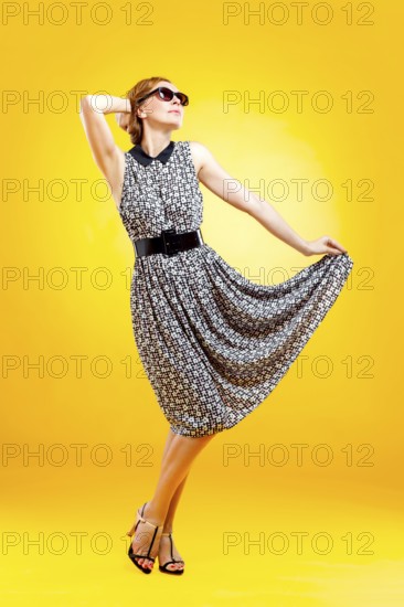 Pin-up girl in american style showing blank signboard