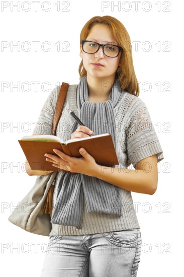 Hipster girl writing with ballpoint pen