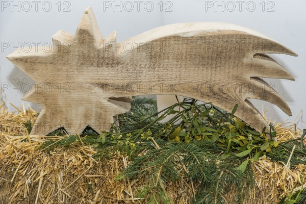 Decorative wooden poinsettia - Bethlehem star, mistletoe, bale of straw