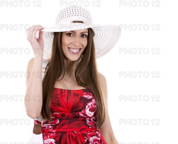 Young woman wearing red dress on white background, Toronto, Canada, North America