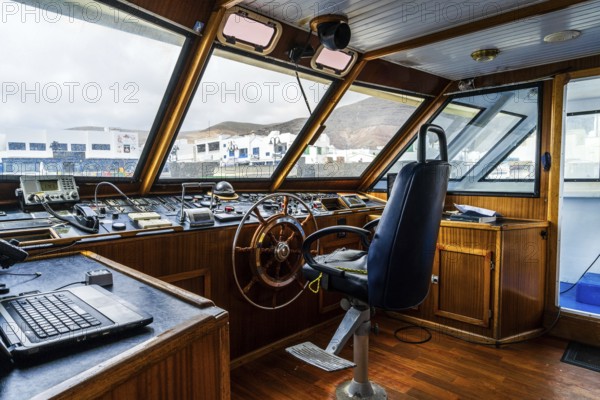 The ferry cockpit will all necessary instruments to travel at boat approaching La Graciosa island, one of Canary Islands, Spain, Europe