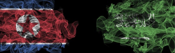 Flags of North Korea and Saudi Arabia on Black background, North Korea vs Saudi Arabia Smoke Flags