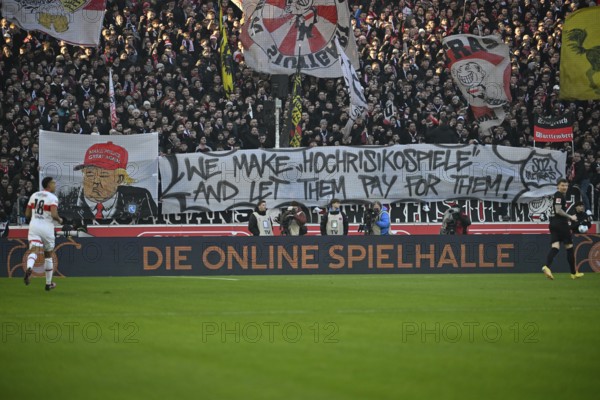 Banner, banner, poster, banner, protest with Donald Trump caricature against the judgement of the Federal Constitutional Court on the assumption of costs for high-risk matches by the club or the DFL, MHPArena, MHP Arena Stuttgart, Baden-Württemberg, Germany, Europe