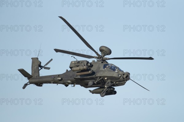 Agusta Westland AH-64 Apache helicopter aircraft in British Army air corps colours flying, England, United Kingdom, Europe