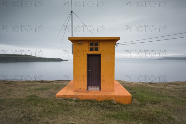 Lighthouse, Drangsnes, Grimsey island in the background, Westfjords, Iceland, Europe
