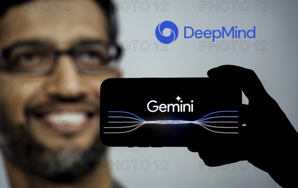 Guwahati, India. 8 December 2023. In this photo illustration a Gemini logo is displayed on a smartphone with Google CEO Sundar Pichai photo displayed in the background