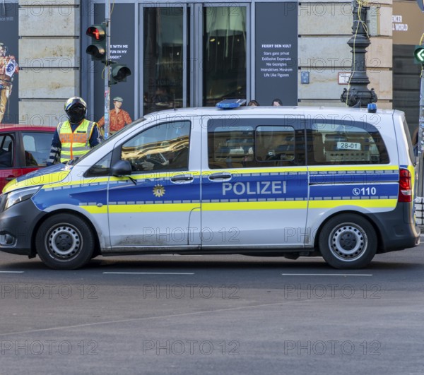 Police officer of the Berlin motorbike squad regulates traffic, Unter den Linden, Berlin, Germany, Europe