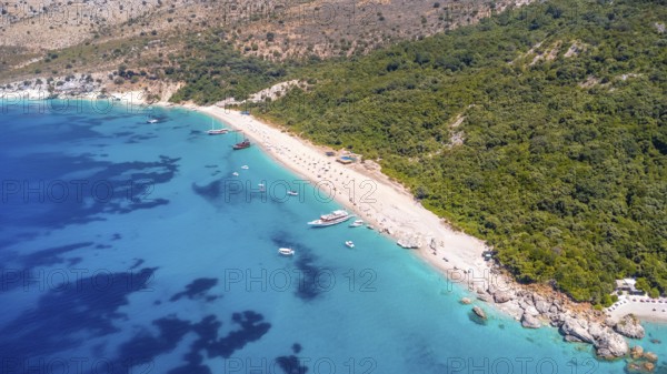 Aerial drone view of the paradise beach of Kroreza or Krorez on the Albanian riviera in Sarande, Albania. turquoise waters