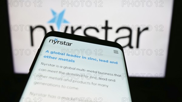 Stuttgart, Germany, 07-28-2023: Smartphone with website of Dutch mining company Nyrstar on screen in front of business logo. Focus on top-left of phone display, Europe