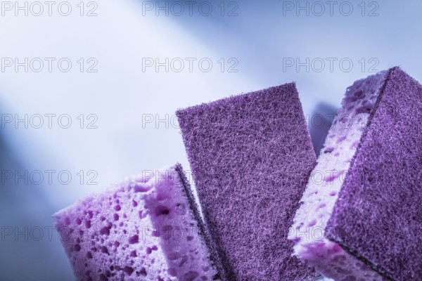 New dishwashing sponges on white background