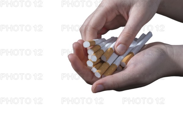 Tobacco smoke addiction, unhealthy lifestyle. Stop smoking, quit smoking or no smoking cigarettes. Hand holdingcigarettes in hands. Quit bad habit
