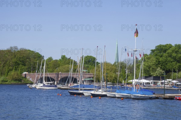 Krugkoppelbrücke with boat hire and Bobby Reich restaurant on the Outer Alster in spring, Harvestehude, Winterhude, Hamburg, Germany, Europe