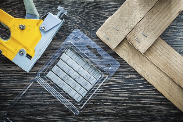 Building stapler gun staples wooden planks