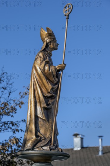 Bronze bishop figure in Seeg, Allgäu, Bavaria, Germany, Europe