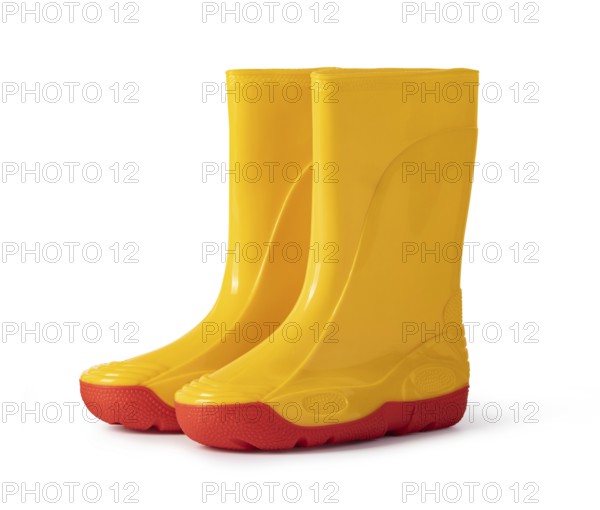 yellow rubber boots isolated on white background