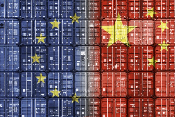 Container with Chinese and European flag, symbolic photo of economic relations and punitive tariffs, photomontage