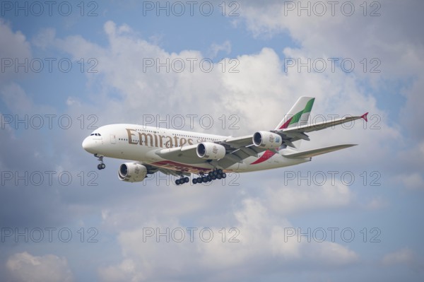 02.06.2024, Berlin, Germany, Europe, An Emirates Airline Airbus A380-800 passenger aircraft with the registration A6-EVG approaching Berlin Brandenburg Airport BER. The Arab airline Emirates from Dubai is once again a guest at this year's ILA with its superjumbo. The Gulf Airline passenger aircraft pictured is an A380-842 in the latest livery, Europe