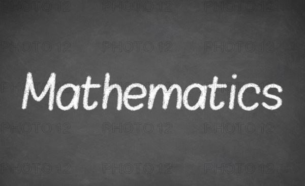 Mathematics lesson on blackboard or chalkboard. written in white chalk