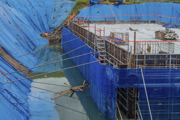 Daejeon, South Korea, August 9, 2020: Foundation for building under construction surrounded by high water after torrential rainfall, South Korea, South Korea, South Korea, South Korea, Asia