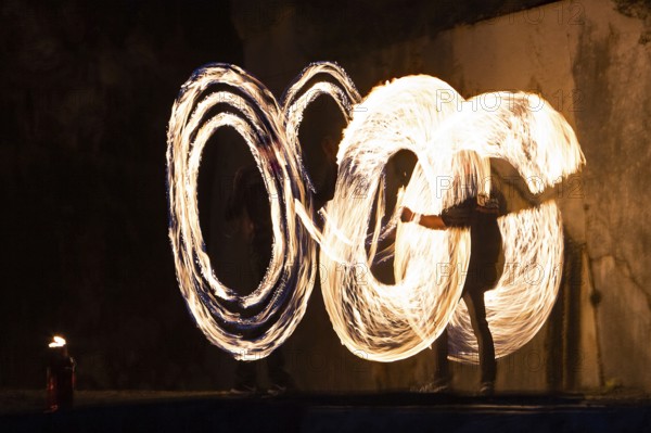 Fire show, pyrotechnics, fire effects, fire poi, light effects, fire glow, quarry site, marching, Bavaria, Germany, Europe