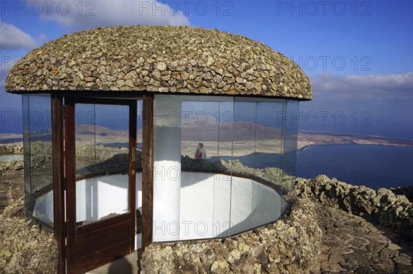 Mirador del Rio, designed by Cesar Manrique, top viewing platform, view over strait El Rio to island La Graciosa and Chinijo archipelago, Lanzarote, Famara Massif, Canary Islands, Spain, Europe