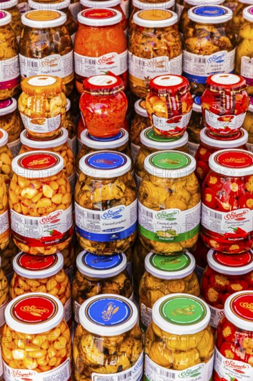 Vegetables in jars on a stall at the Whitsun market in Portoferraio, Elba Island, Tuscan Archipelago National Park, Tuscany, Italy, Europe
