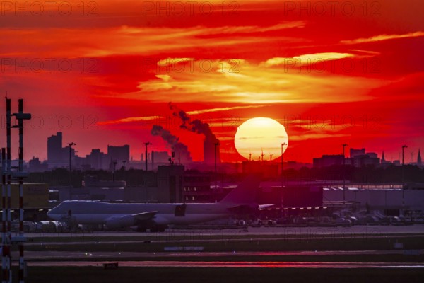Cologne Bonn Airport in the evening with sunset and sunset. Cologne, North Rhine-Westphalia, Germany, Europe