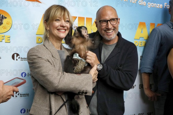 Heike Makatsch and Benno Fürmann at the Berlin premiere of AKIKO - DER FLIEGENDE AFFE at the Filmtheater am Friedrichshain in Berlin on 25 May 2025