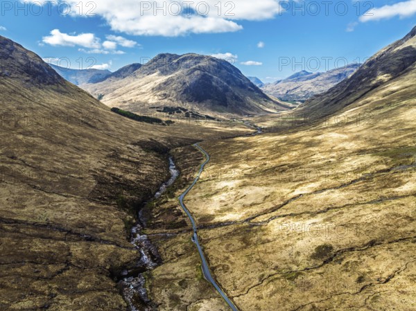 Mountains and Moors over Glen Etive Valley from a drone, Buachaille Etive Mòr, The Buachaille, Highlands, Scotland, United Kingdom, Europe