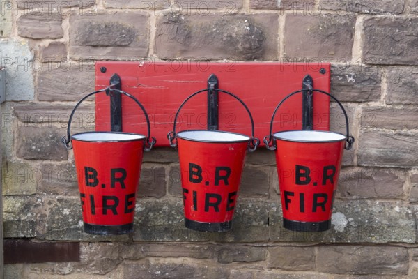 Fire bucket, railway station, Winchcombe, The Cotswolds, England, Great Britain