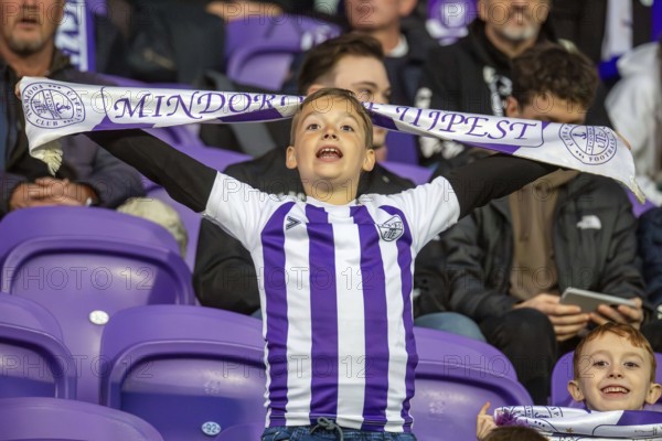 Football NL I. Hungary 2024/25 season, matchday 32: Újpest FC vs Nyíregyháza Spartacus***Young fan full of anticipation for the match