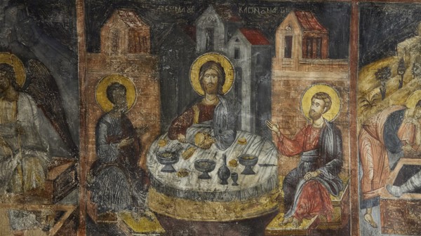 A fresco of the Last Supper with saints, dominating gold and brown tones, Easter 2025, Church of the Dormition of the All-Holy God Bear, Kimisis tis Theotokou, Asklipio, Rhodes, Dodecanese, Greek Islands, Greece, Europe
