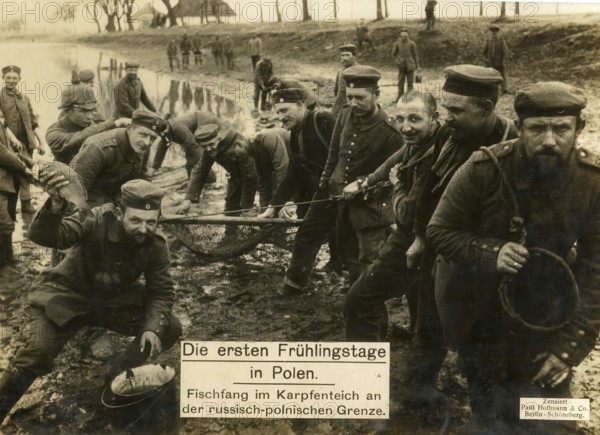 The first days of spring in Poland, fishing in a carp pond on the Russian-Polish border, 1914 - 1918, World War I, reproduction of a wartime postcard