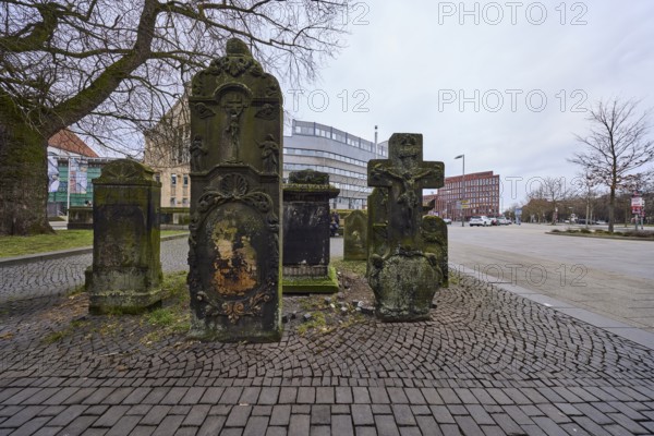 Historical gravestones, general architecture, pavement made of cobblestones, diffuse light, cloudy, Goseriede street, Hanover, state capital, Hanover region, Lower Saxony, Germany, Europe