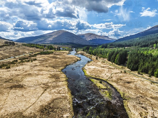 Mountains and Moors over Loch Tulla and River Orchy from a drone, Highlands, Scotland, UK