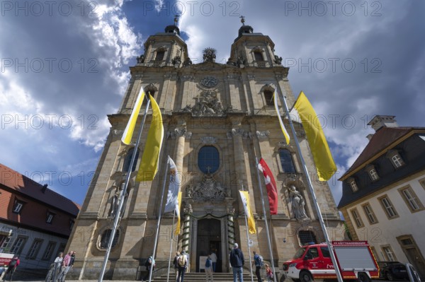 Parish and pilgrimage church of the Holy Trinity, basilica in Gößweinstein with pilgrimage flags, Upper Franconia, Bavaria, Germany, Europe