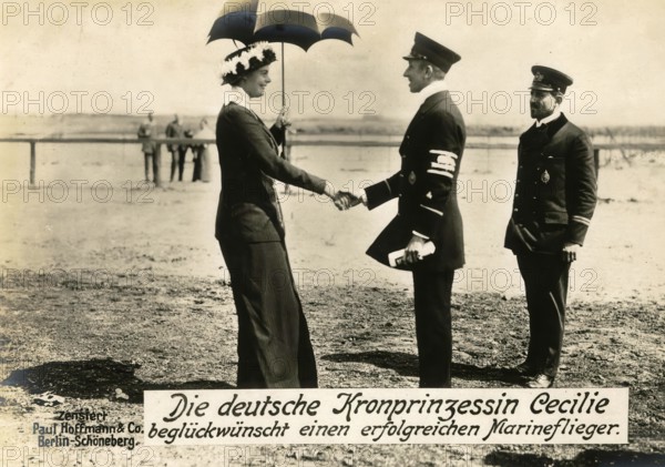The German Crown Princess Cecilie congratulates a successful naval aviator, 1914 - 1918, World War I, reproduction of a war postcard