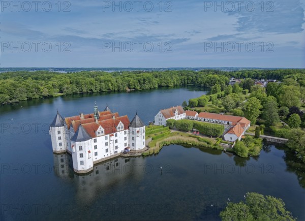 Glücksburg Castle and the castle pond. The lake is part of the Munkbrarupau stream. Aerial view. Glücksburg, Schleswig-Flensburg district, Schleswig-Holstein, Germany, Europe