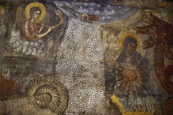 A fresco shows an angel and Mary under a starry sky with a dragon-like creature, Easter 2025, Church of the Dormition of the All-Holy God Bear, Kimisis tis Theotokou, Asklipio, Rhodes, Dodecanese, Greek Islands, Greece, Europe