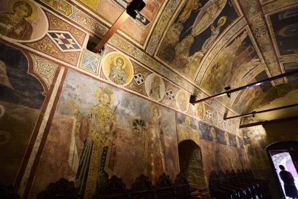 Historic church art with frescoes on the walls and vaulted ceiling, atmospheric lighting, Thari Monastery, Moni Thari, near Gadouras Reservoir, secluded mountain region, Rhodes, Dodecanese, Greek Islands, Greece, Europe