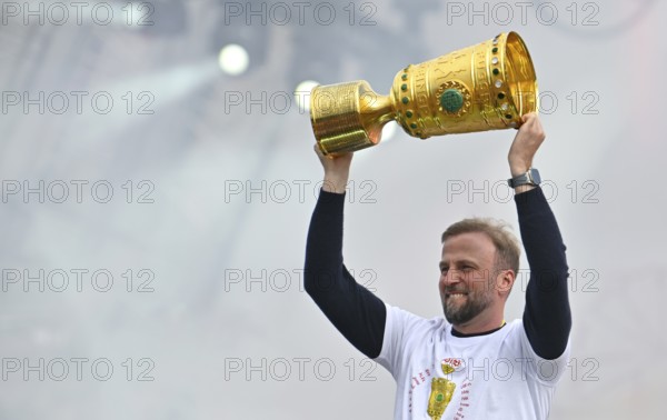 Coach Sebastian Hoeneß VfB Stuttgart with trophy, jubilation joy emotion VfB Stuttgart victory celebration, VfB Stuttgart team celebrates winning the DFB Cup 2025 in Stuttgart at Schlossplatz, Stuttgart, Baden-Württemberg, Germany, Europe