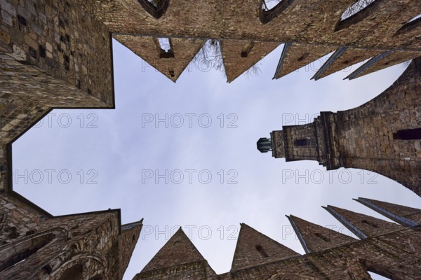 Ruins of the Aegidienkirche, memorial for victims of war and violence, church tower, church, vertical frog perspective, diffuse light, milky blue cloudy sky, Hanover, state capital, Hanover region, Lower Saxony, Germany, Europe